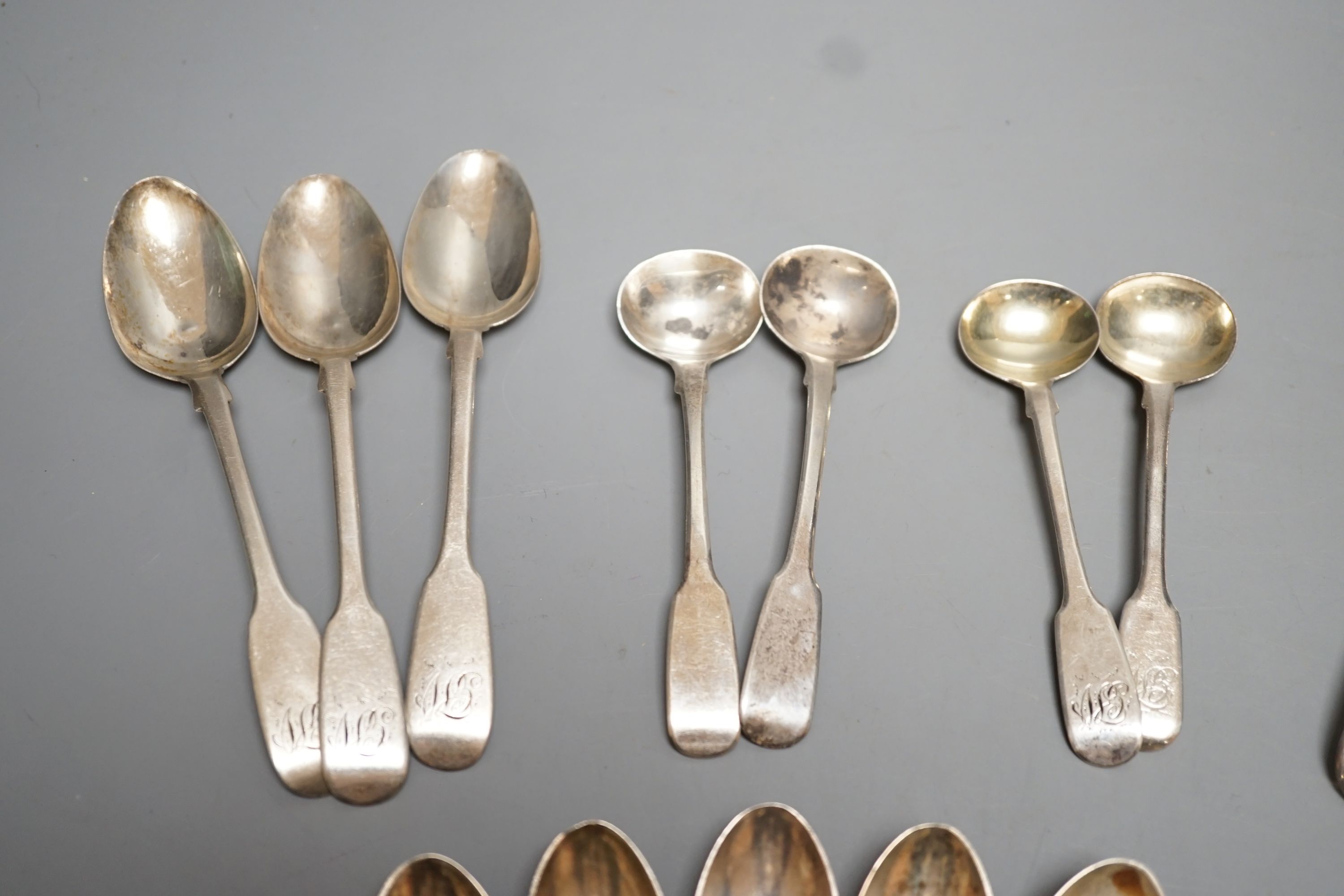 A quantity of silver teaspoons, sifter spoons and condiment spoons, including a set of six coffee spoons, London, 1899